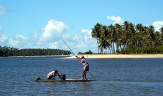Fishermen at freshwater stream